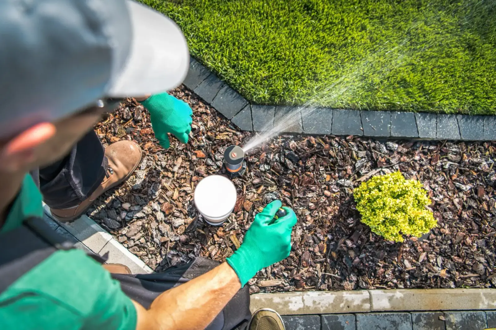 Rocket Turf technician repairing a residential sprinkler system