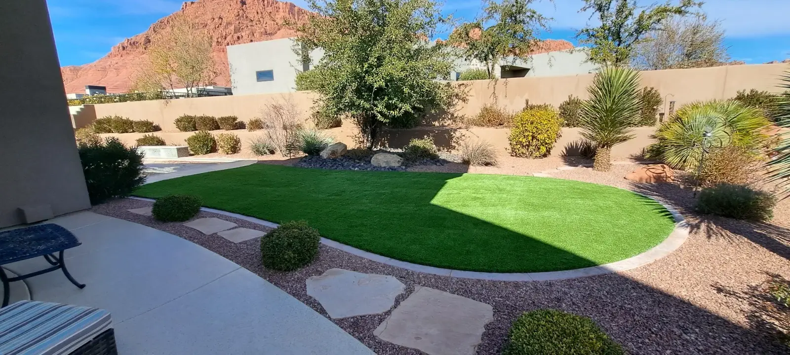 Turf and rock bed front yard